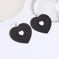 Three-layer nested black acrylic heart earrings with glossy finish and silver hooks - Heart Nested Design (EH00034) / Black