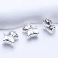 Vue macro de perles de cheval en argent avec finition miroir polie et gravure logo H - Style Cheval du Zodiaque (Q228) / Argent