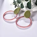 Olive green acrylic oval and pink translucent hoop earrings with a geometric design - Green And Pink (EH00002)