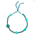 Collana con disco in acrilico turchese effetto acqua e cordino etnico regolabile - blu-verde