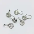 Dettaglio di orecchini a clip a spirale placcati oro 18 carati per creazione gioielli DIY - Placcato Platino