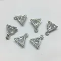 Detail of six triangle alloy pendants with inlaid zircon and fine engraved edges - Triangle Shape / Silver