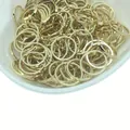 14k gold plated minimalist circular DIY jewelry charms and rings in a white ceramic bowl - 15mm / Light gold