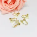 Macro shot of 5 screw-adjustable gold-plated earring clip converters for DIY jewelry making - Without Hanging Loop / Light gold