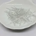 Chiodini a testa piatta in argento lucido per gioielli fai da te su sfondo bianco - B83 0.6x26mm / Argento