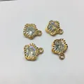 Set of 4 gold flower pendants with central zircon stones for DIY jewelry making - Plum Blossom / Gold
