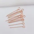 Close-up of 14k gold-filled rose gold eye pins for DIY jewelry making and beading - 30mm x 0.5mm / Rose Gold Plated (Color Retention)