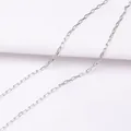 Macro shot of bright silver-tone oval link chain for DIY jewelry making and necklace crafts - Rhodium Plated