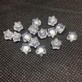 Macro shot of transparent star-shaped acrylic spacer beads with holes for DIY jewelry - Star Style (A90) / Real Silver Color