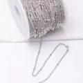 Silver satellite chain on a white spool for DIY jewelry making and handmade crafts - Rhodium Plated