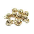 Detailed macro view of 14k gold-plated hollow bell charms for DIY jewelry making - F41 14k Gold Plated