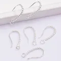 Detailed macro view of 14K gold plated silver twist earring hooks for DIY jewelry making - Silver (Color Retention)