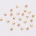 Close-up of square 18K gold plated spacer beads for DIY jewelry making and crafts - 3mm / 14K Gold