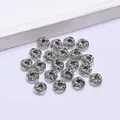 Polished silver twisted metal spacer beads for jewelry making and DIY bracelet design - Platinum Plated