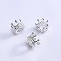 Detail of three silver 14K gold-plated crown spacers with micro-set zircon for DIY jewelry - Silver