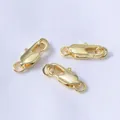 Dettaglio di chiusure a coda di pesce placcate oro 18K con marchio 925 per gioielli - Placcato Oro 18K