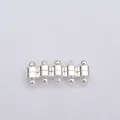 Macro detail of five silver cylindrical magnetic clasps for DIY jewelry making - Cylinder (B13) / Silver