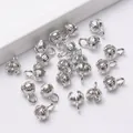 Close-up of silver-plated vertical striped bell-shaped DIY jewelry clasp accessories - Platinum Plated
