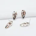 Detailed macro view of S925 silver stud earrings with liquid metal irregular design - Long Narrow Style (L20 2#) / Silver