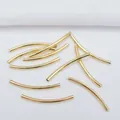 Close-up of polished 14k gold plated curved tube beads for DIY jewelry making - M26 Style (2x30mm) / 14K Gold