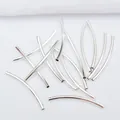 Close-up of polished silver curved tube beads for DIY bracelet and necklace jewelry making - M26 Style (2x30mm) / Silver