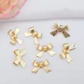 Set de siete colgantes de lazo en oro de 14k esmerilado para creación de joyas DIY - Bañado en Oro de 14K