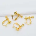Detail view of 4pcs golden spiral clip-on earring converters with adjustable screws - Gold