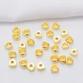Detailed view of 14k gold-plated triangular spacer beads for DIY jewelry making - 3mm / 18K Gold Plated