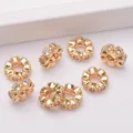 Detailed macro view of 14K gold plated petal spacer beads with zircon inlays for DIY jewelry - Outer Diameter 6mm / 14K Gold Plated