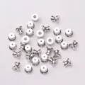 Vista macro di chiusure per orecchini placcate argento 18k per creazione gioielli DIY - Oro Bianco Placcato Base