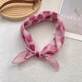 Detail of pink cotton-linen scarf featuring deep rose watercolor polka dots and fine stitching - Dragon Fruit Polka Dot