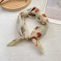 Detailed close-up of retro polka dot cotton linen square scarf with premium hemmed edges - Polka Dot Yellow