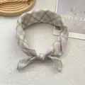 Detail of pink and green plaid cotton bandana with refined edge stitching and soft texture - Plaid Green