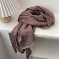 Detailed texture of dark brown linen scarf showing natural pleats and soft breathable fabric - 230x57cm / Rouge Red