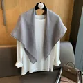 Detail of grey cotton linen scarf with white polka dots and elegant draped texture - Gray