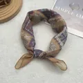 Macro shot of ethnic print scarf with geometric patterns in earthy tones for styling - One Size / Yellow