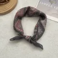 Detail of vintage bohemian headscarf featuring ethnic patterns on soft linen fabric - One Size / Black