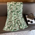 Detail of green leaf pattern with gold silk embroidery on a luxury silk scarf - 180*70cm / Green