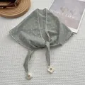 Green floral triangle scarf with white wavy edges and delicate knit flower charms - Green