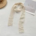 Close-up of beige floral lace scarf with delicate hollow embroidery and sunflower patterns - Beige Soft Gauze