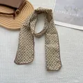 Detail of vintage floral cotton linen scarf with red wavy stitched edges and diamond pattern - Lattice Khaki