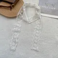 Elegant white lace ribbon scarf for hair or neck displayed on a minimalist background - Snowflake / 75x4cm