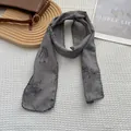 Close-up of vintage floral cotton linen scarf with delicate lace edging and grey flower pattern - Lavender Grey