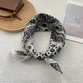 Unisex paisley print ramie bandana featuring a classic black and white boho pattern - Big Paisley White