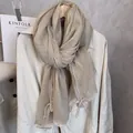Elegant beige linen scarf with white lace trim and decorative bows for summer sun protection - Flaxen