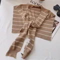 Classic brown and white striped knit shawl wrap with front button in minimalist French style - Camel