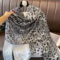 Detail of grey leopard print scarf with gold foil accents and soft cotton linen texture - 180cm x 90cm / Gray