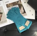 Pfauenblaue Handschuhe aus 100% australischer Wolle mit Strickdesign für Touchscreens - Himmelblau