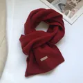 Detail showing 100% pure Australian wool texture and rib edge of this dark red scarf - Retro Copper