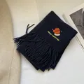 Detail of navy blue scarf with Merry Christmas glove embroidery and soft tassels - Navy Blue Lucky Gloves